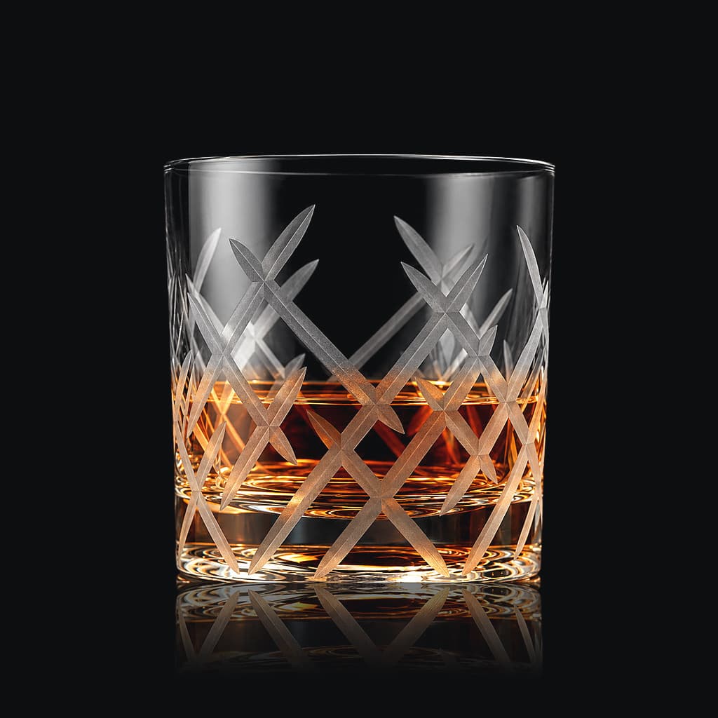 SHTOX Crown Matte tumbler with whisky, on black