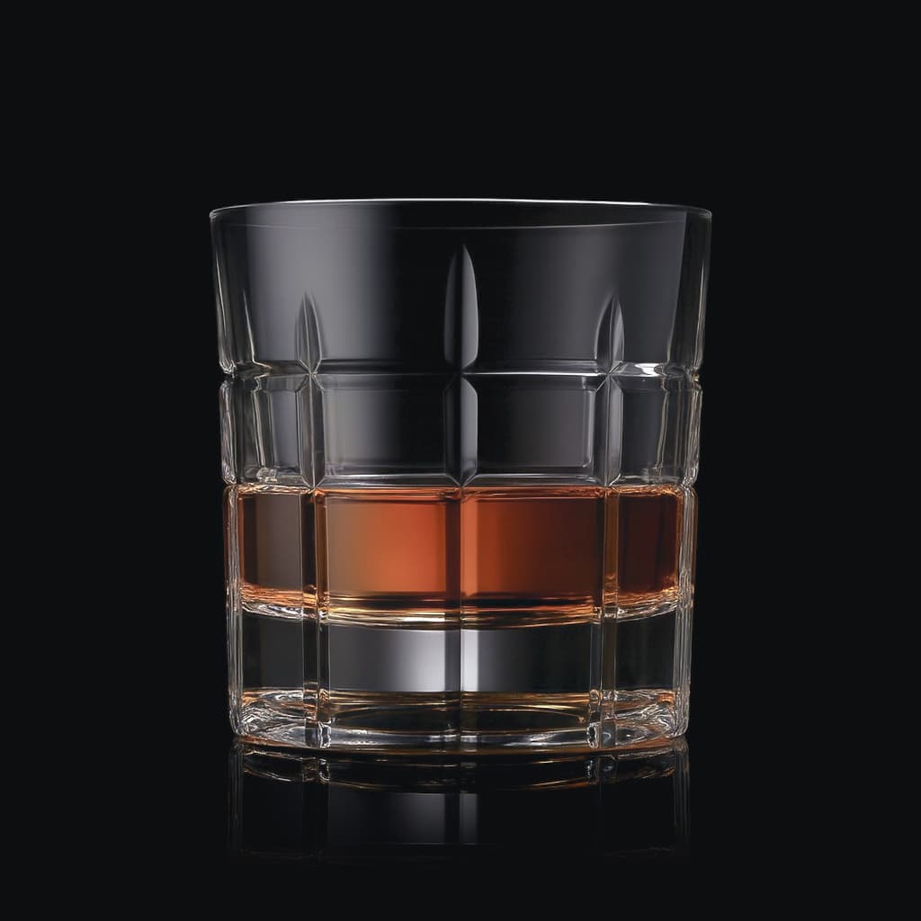 SHTOX Meridian tumbler with whisky, on black