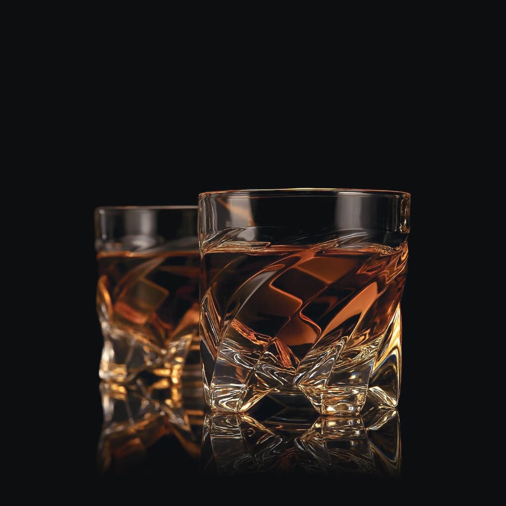 Two SHTOX Edgewave shot glasses with whisky