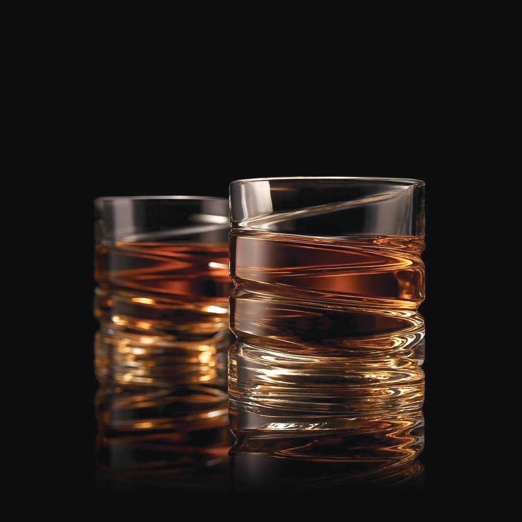 Two SHTOX Vortex shot glasses with whisky