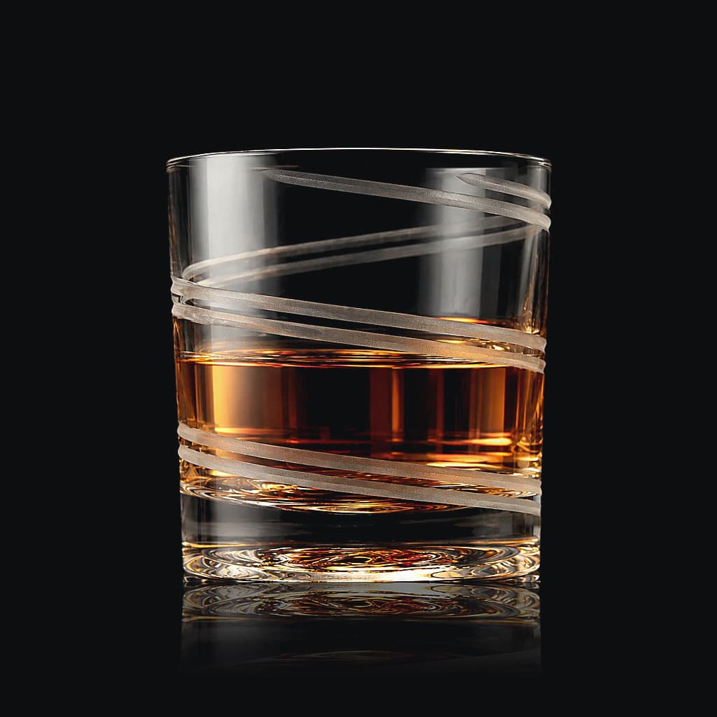 SHTOX Vortex Matte tumbler with whisky, on black