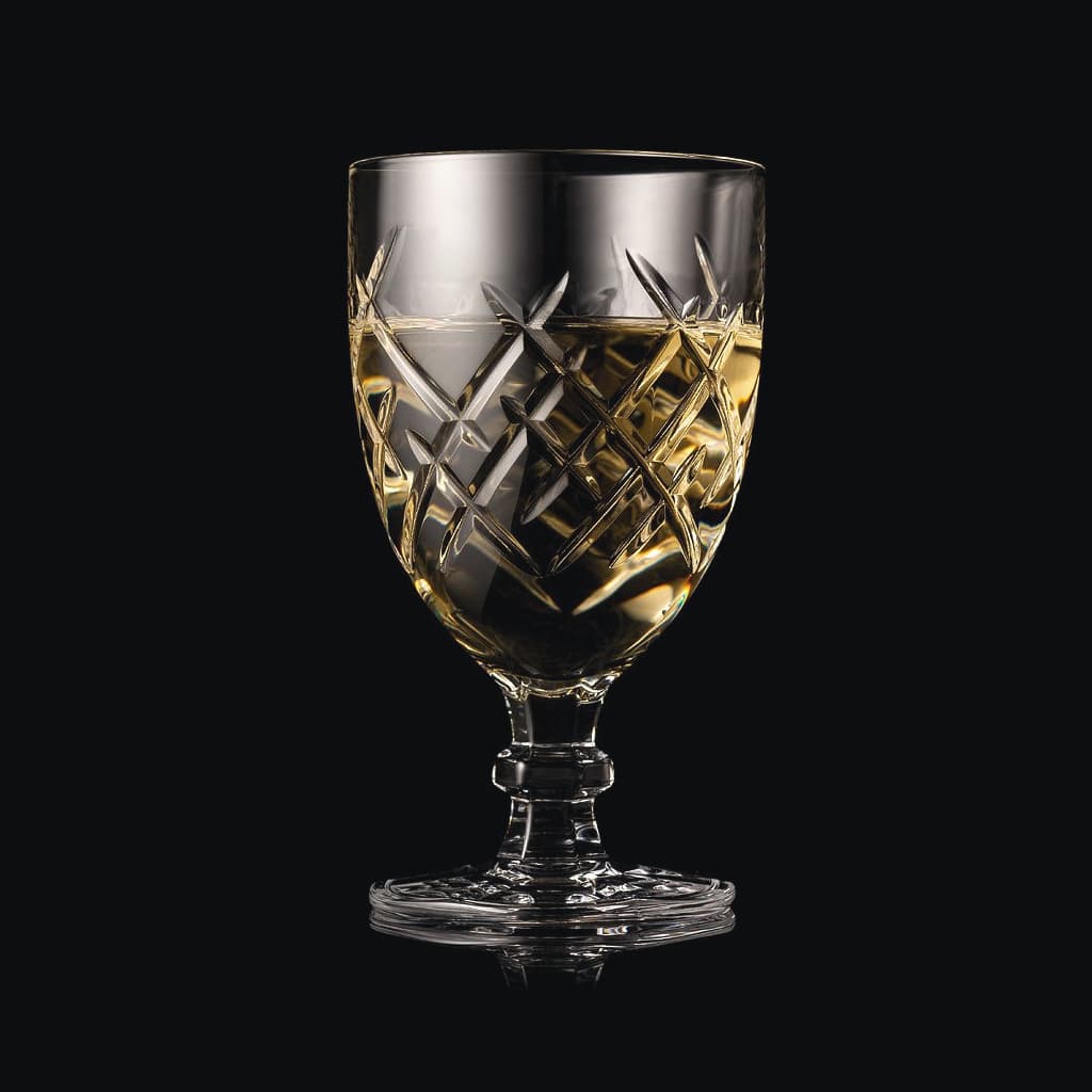 SHTOX Crown wine glass with white wine, on black